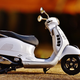 Illustration for article titled Two Person Electric Mobility Scootersem/em